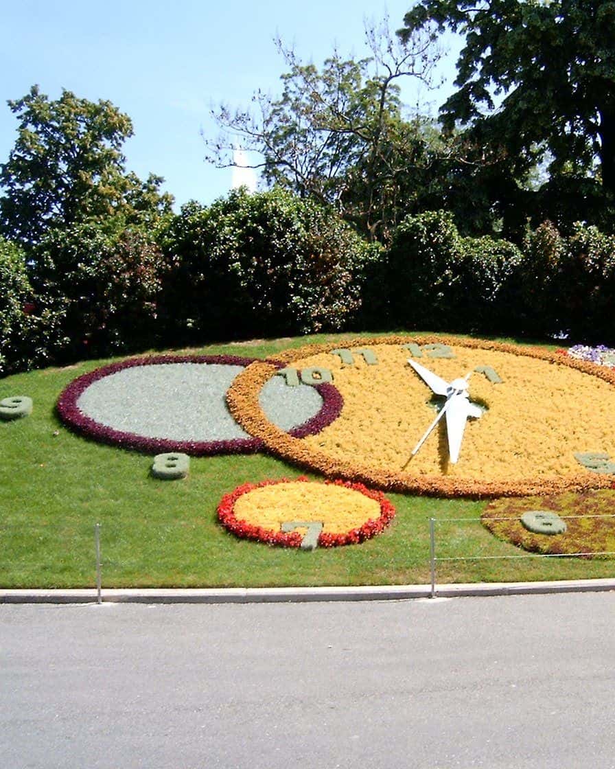 The Flower Clock in the Jardin Anglais in Geneva, a large dial made of thousands of flowers by the lake