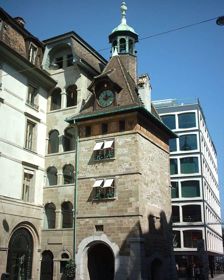 The Place du Molard in Geneva and its medieval tower, between the shopping streets of the lower town and the lake