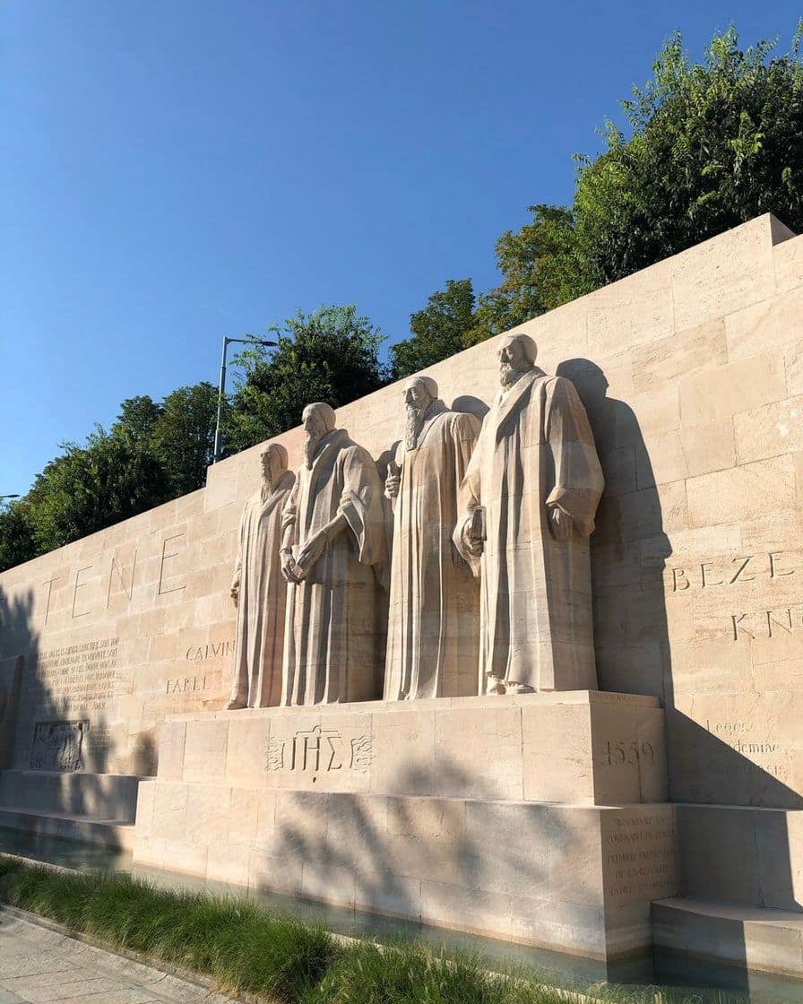 The Reformation Wall in the Parc des Bastions in Geneva, with the large stone statues of Calvin and the reformers